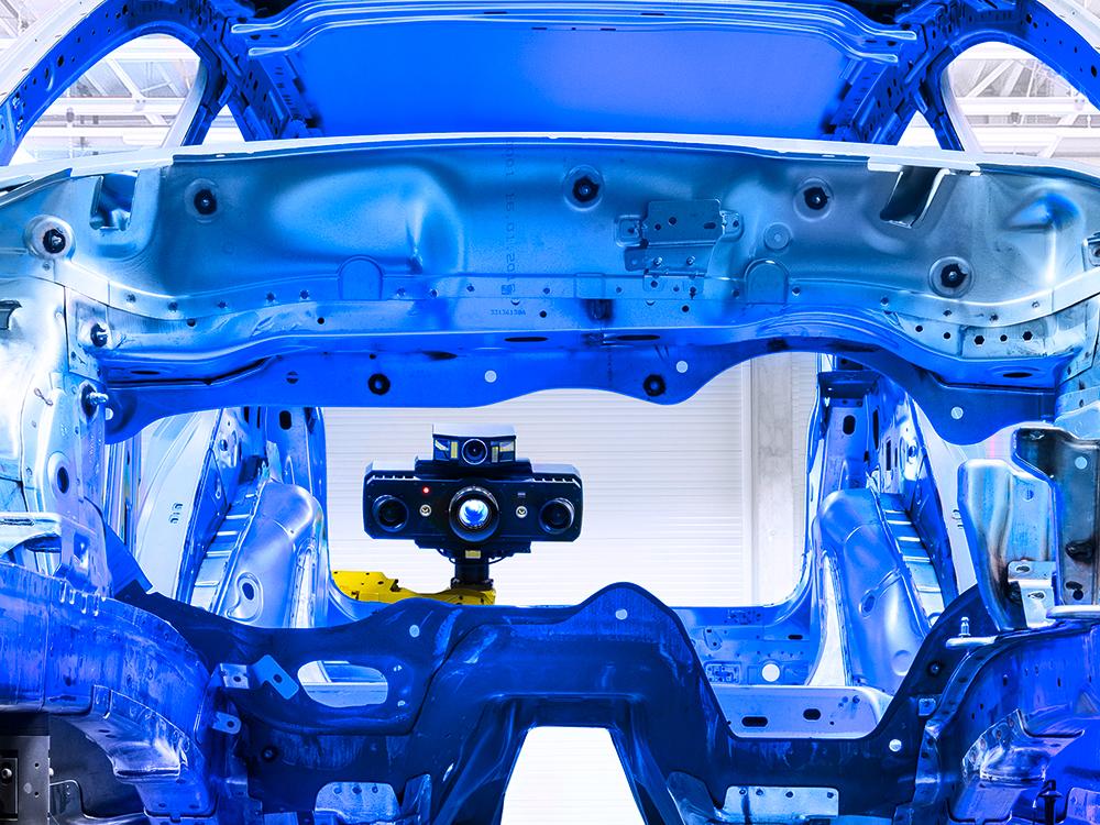 Numérisation automatisée de grandes surfaces de mesure