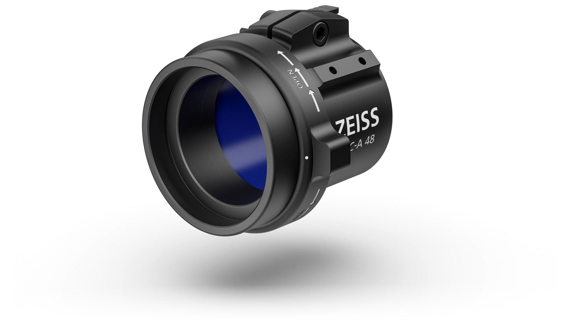 Black ZEISS optical device with blue-tinted lens and white branding, shown on a white background.