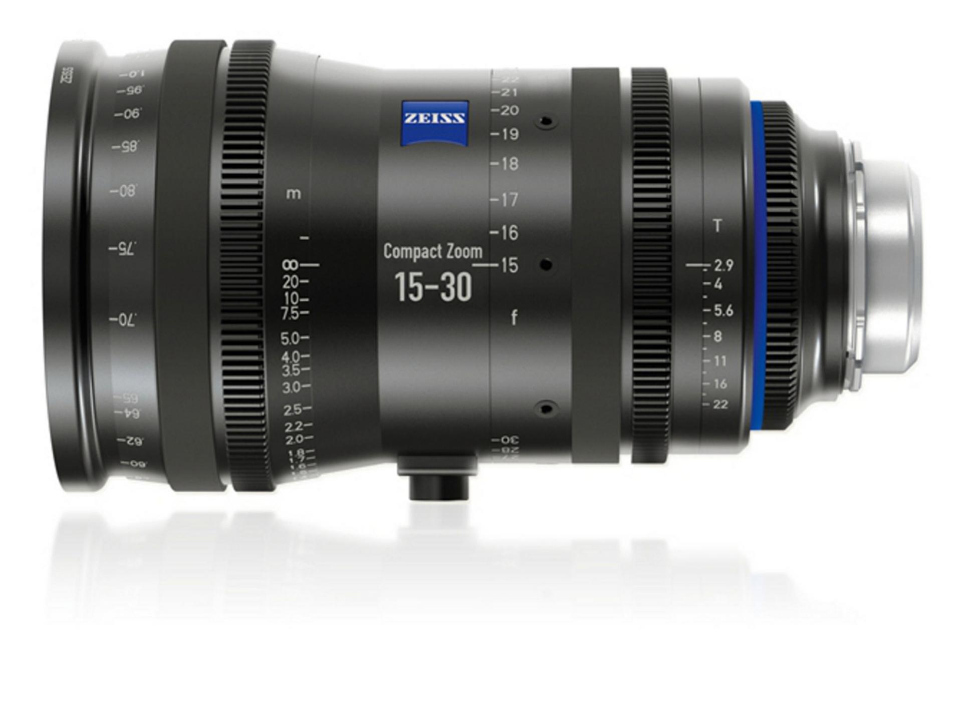 Side view of a ZEISS Compact Zoom 15-30mm camera lens with branding and focal length markings visible.