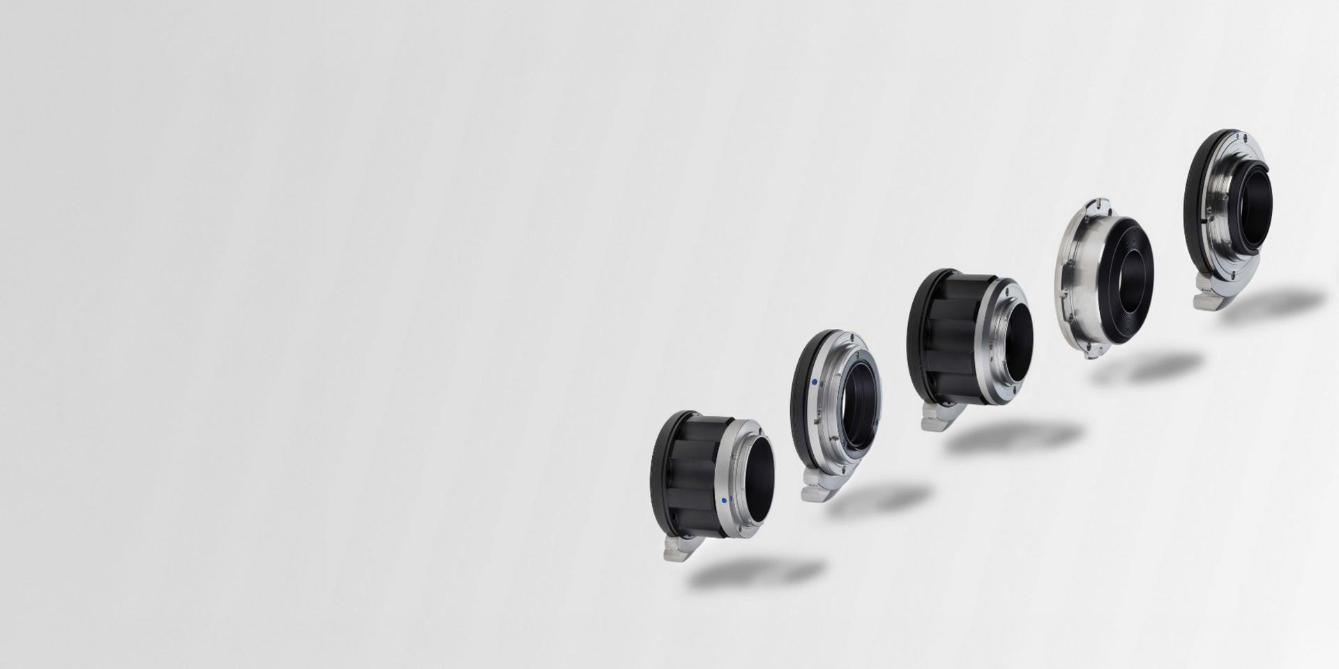 Five ZEISS lens adapters are displayed in a row on a light gray background.