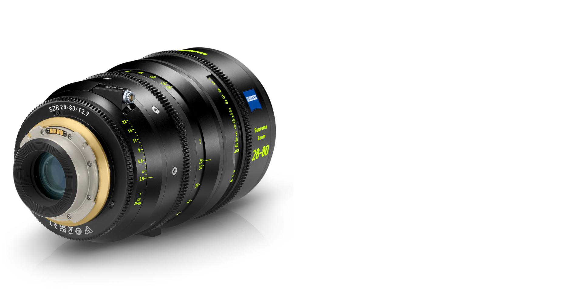 Black ZEISS cinema lens featuring precision focus, zoom, and aperture rings with engraved yellow and white markings, and the ZEISS logo prominently displayed.