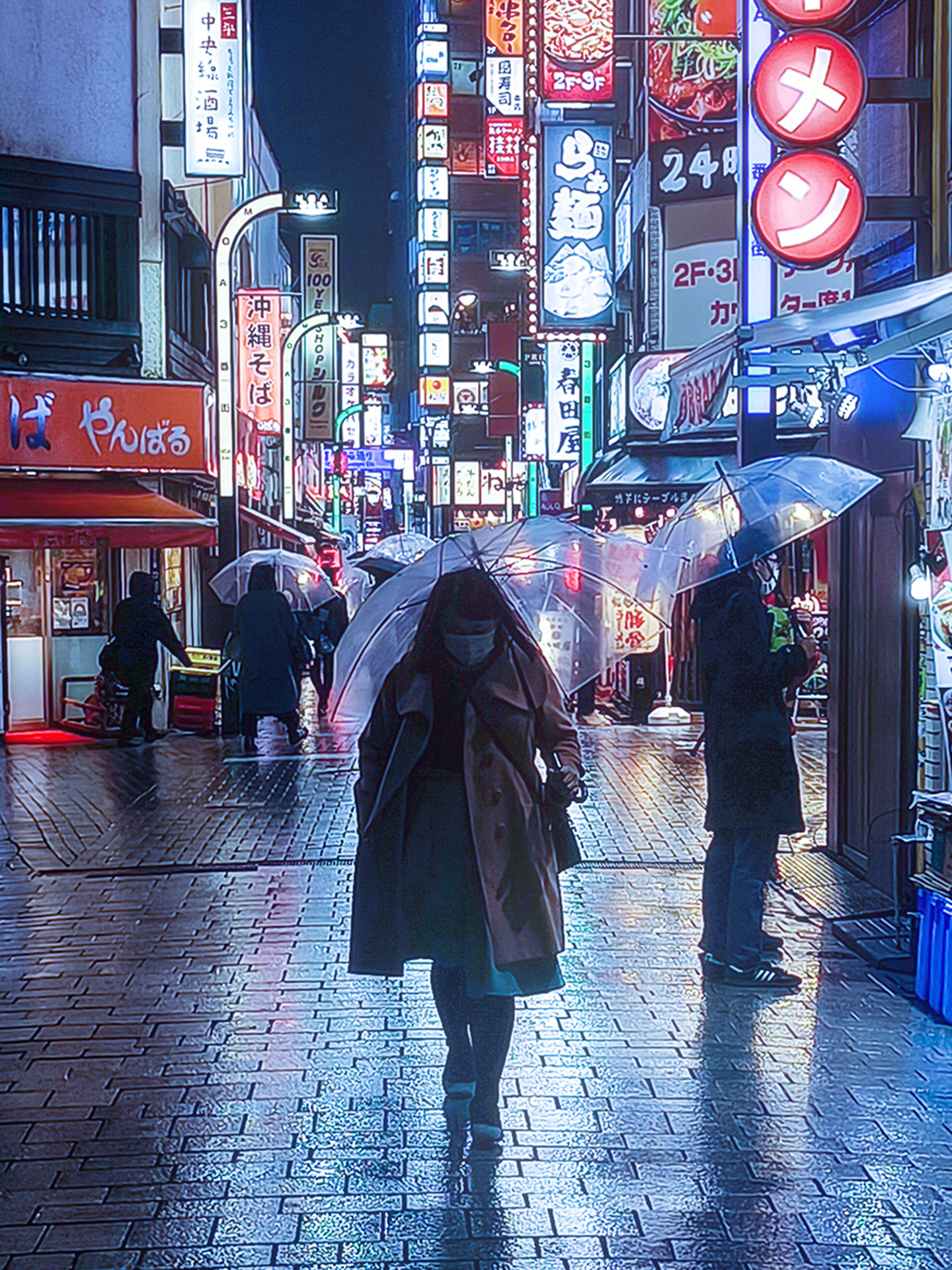 People walk with transparent umbrellas along a brightly lit, rainy street in an urban area at night, with colorful illuminated signs in the background.