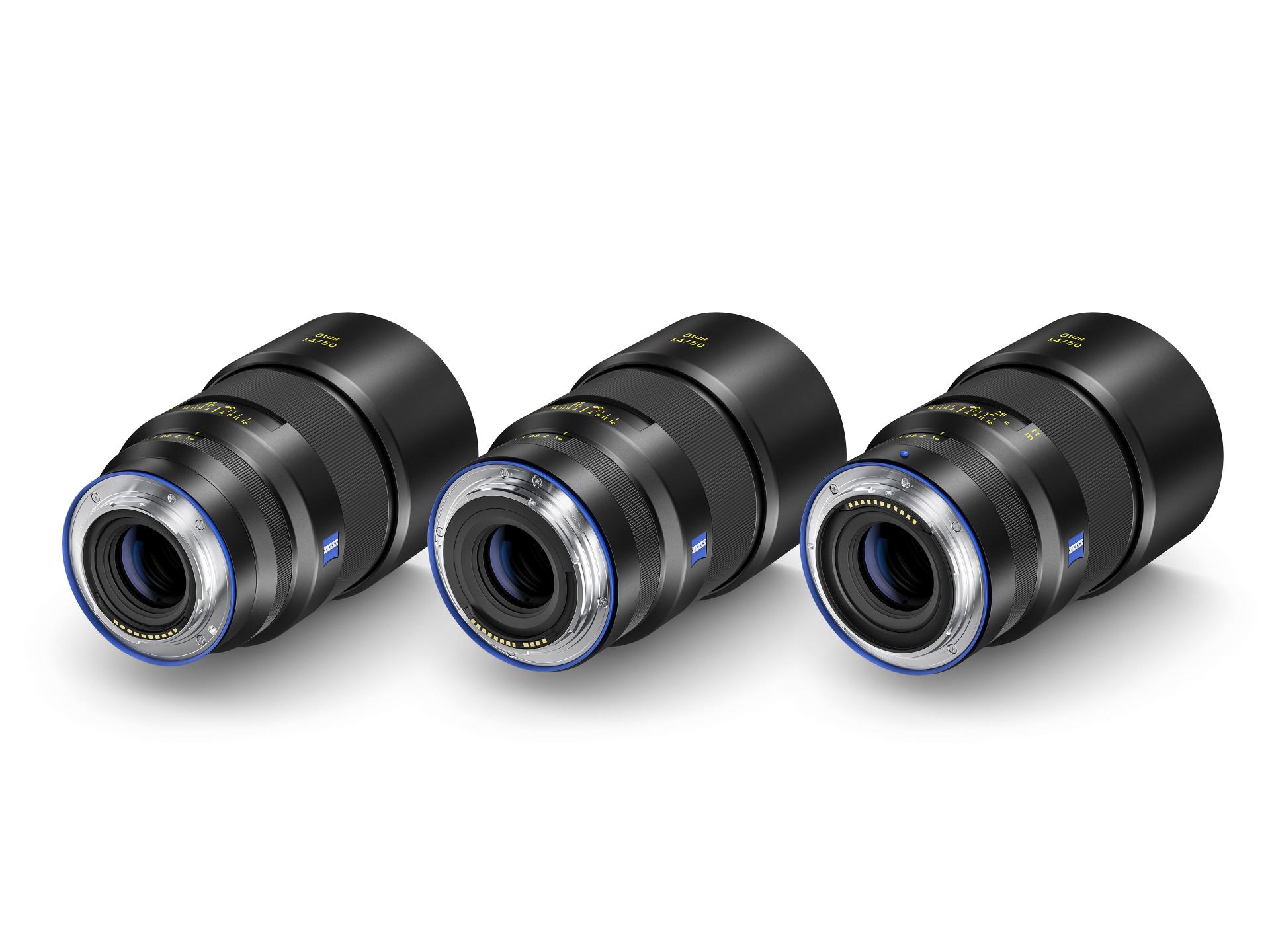 Black ZEISS camera lens with blue ring and ZEISS logo, shown from the rear angle.