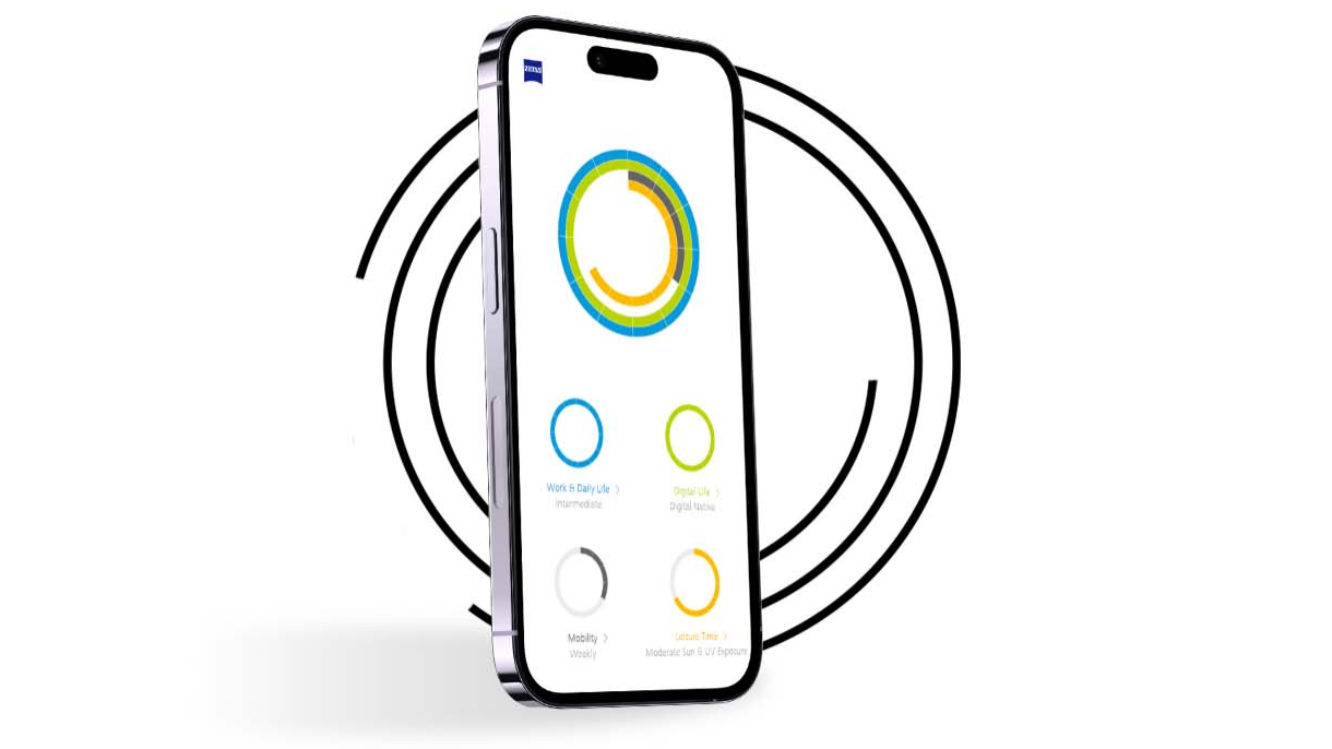 Un smartphone, devant des cercles noirs, montre le profil visuel d’un utilisateur de Mon profil visuel présentant des cercles de différentes couleurs. 