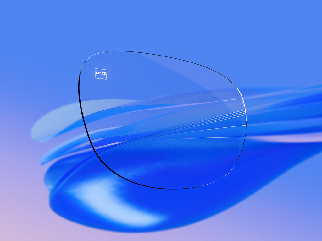 Illustration 3D en images de synthèse d'un verre de lunettes transparent présentant de légers reflets, soulignant sa clarté exceptionnelle et sa qualité optique.