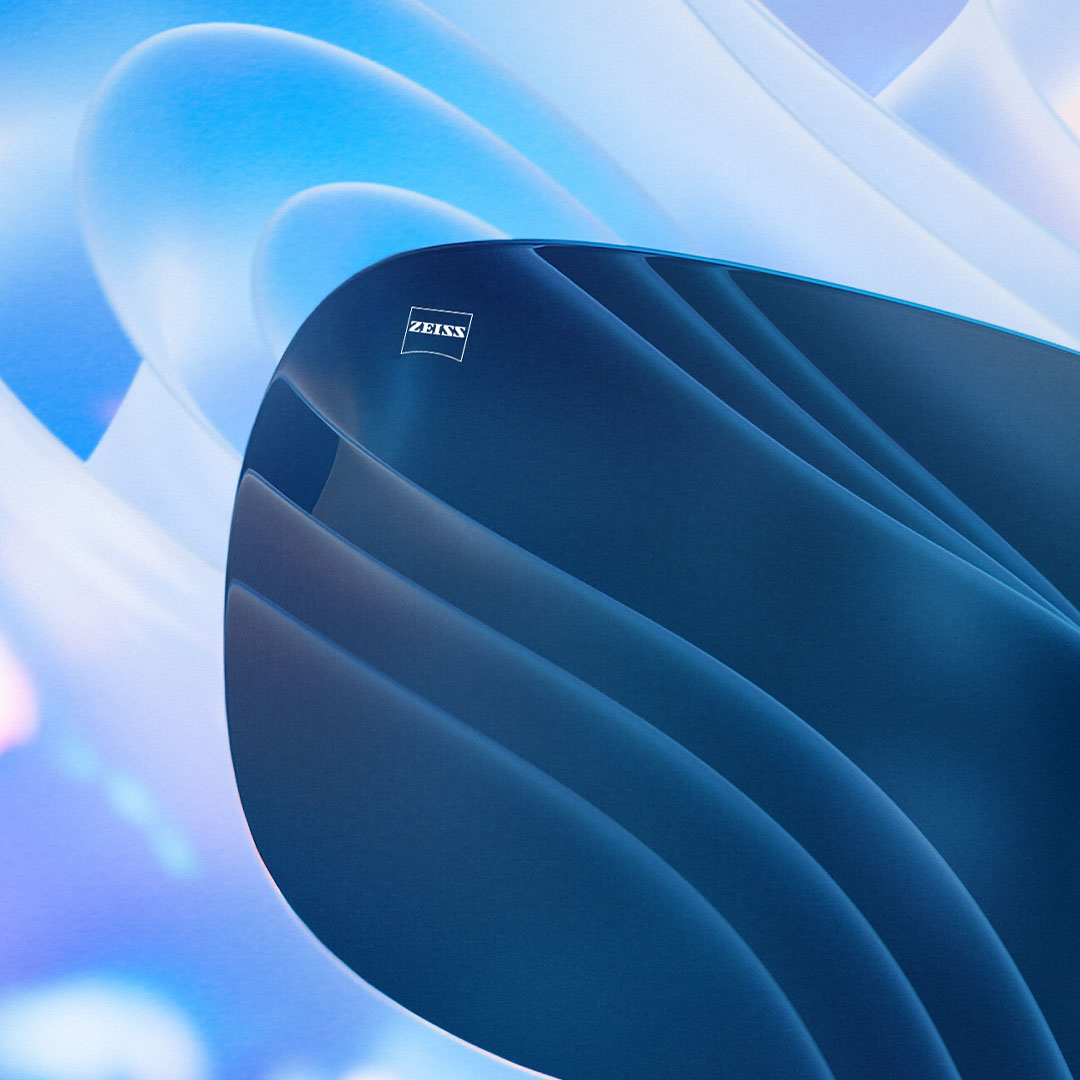 Un verre teinté bloquant efficacement l’éblouissement visible dans l’arrière-plan est représenté en images de synthèses.